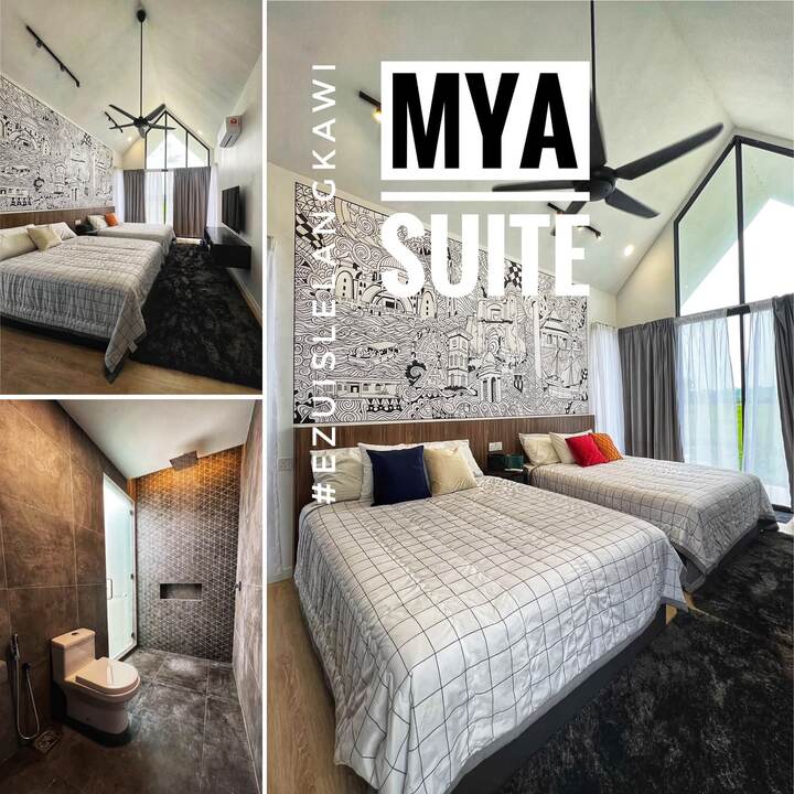Mya Suite: two queen beds, high ceilings and full-height glass looking over the padi